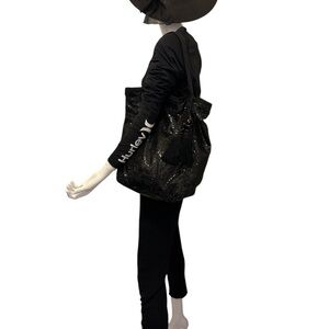 JUICY COUTURE BLACK
SEQUIN SABRINA TOTE BAG
ORG. $148.00 new conditions